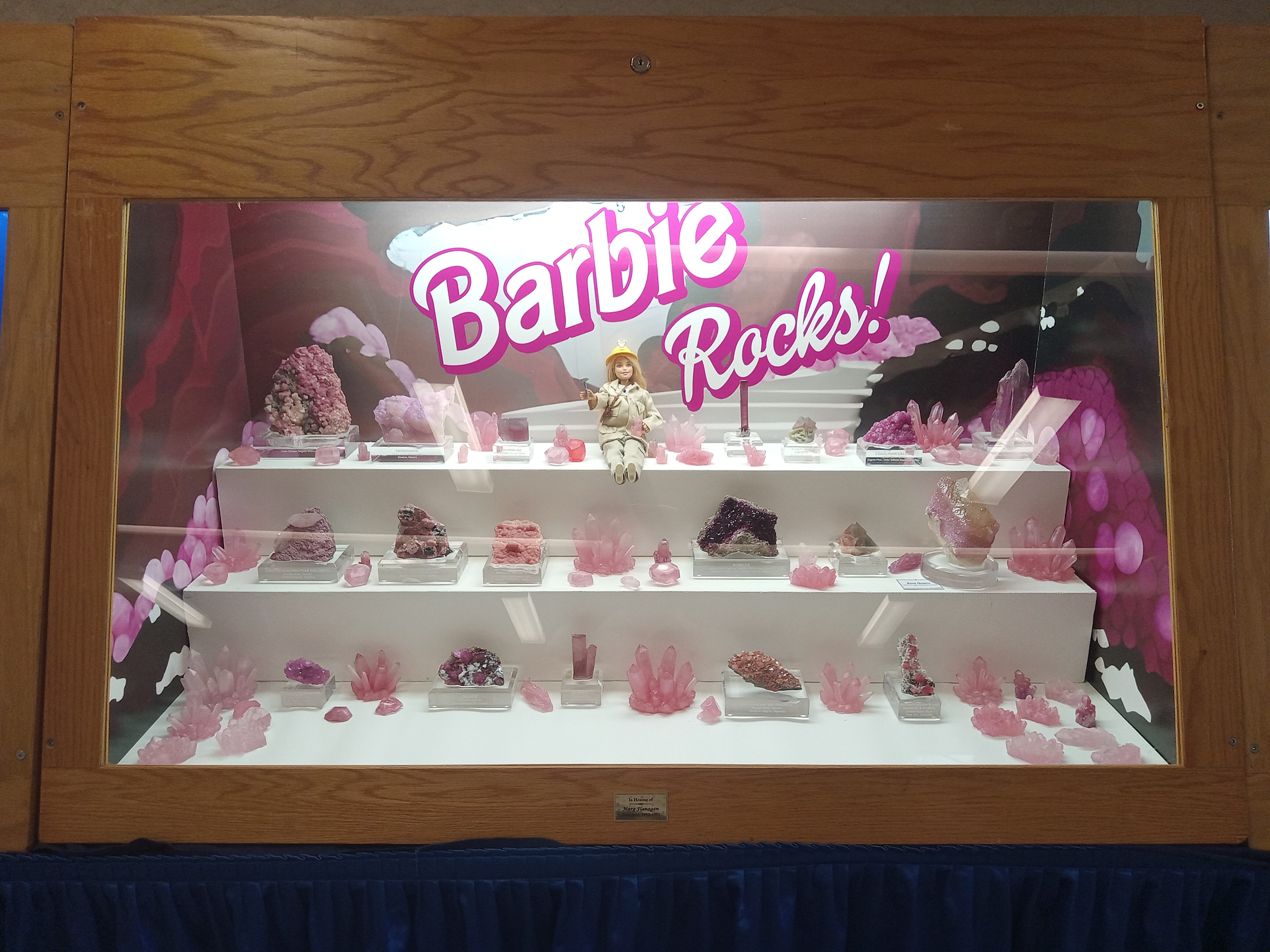 The Danneffel Family's Barbie Rocks display featuring pink rocks, mineral specimens and resin pieces at the 2023 Everything Rocks show.